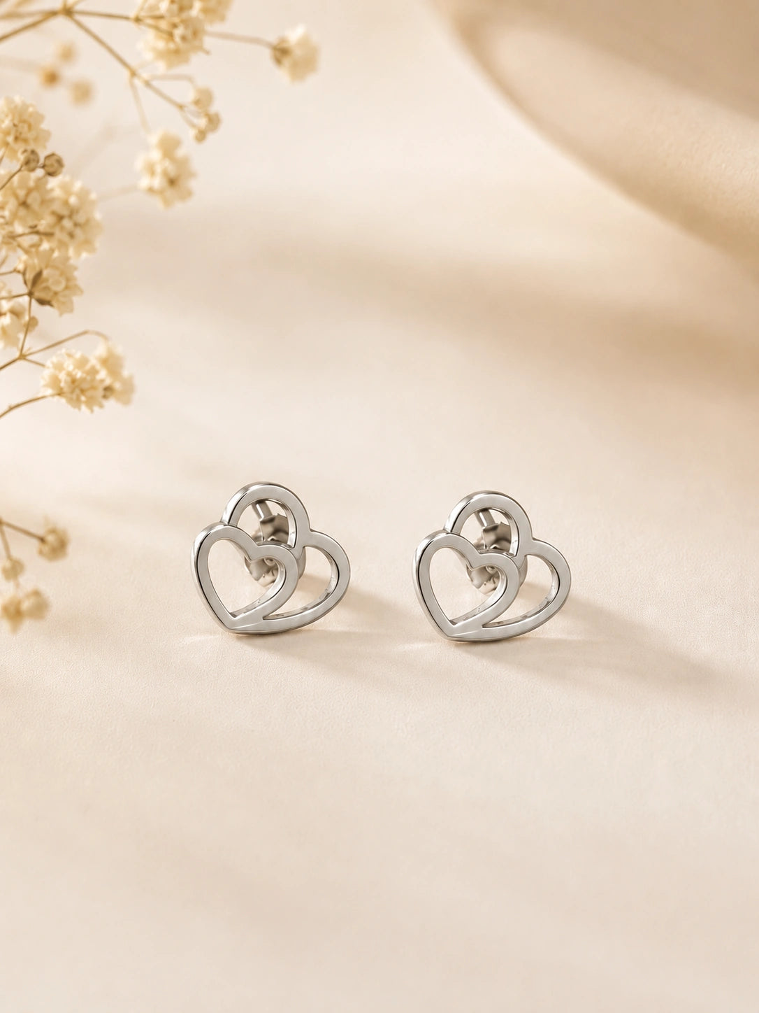 Boucles d’oreilles double cœur argenté en acier inoxydable pour femme