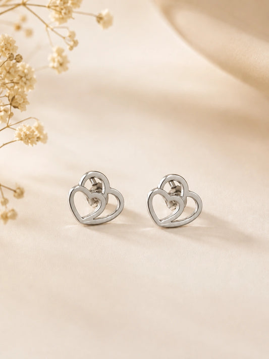Boucles d’oreilles double cœur argenté en acier inoxydable pour femme