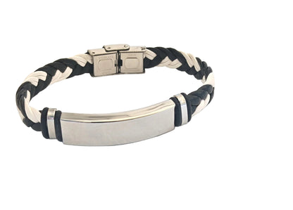 Optez pour ce bracelet en cuir tressé et acier inoxydable, personnalisable avec la gravure de votre choix. Que ce soit un prénom, une date, un mot doux ou un symbole, il devient un bijou chargé de sens.