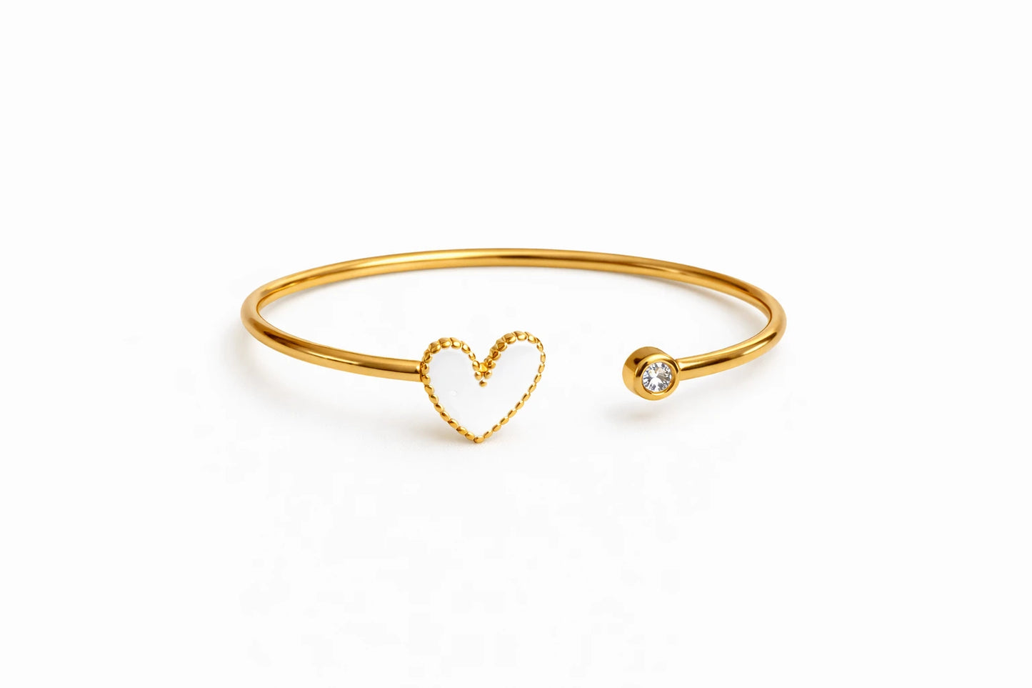 Un jonc cœur en acier inoxydable doré, symbole d’amour et de douceur, à porter chaque jour ou à offrir à ceux qui comptent.